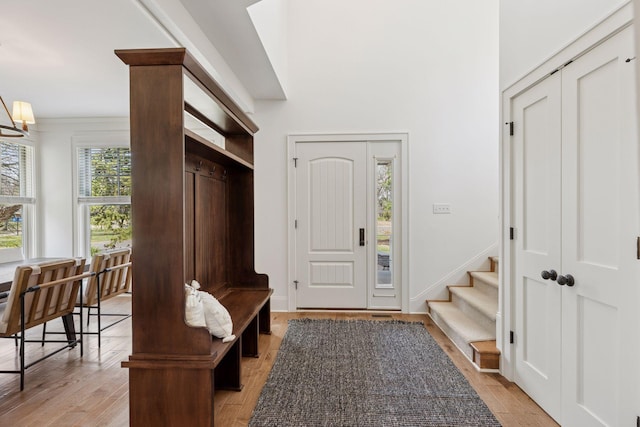 38 Mississippi River Blvd N, Saint Paul, MN 55104 - mudroom with light wood-type flooring and a chandelier
