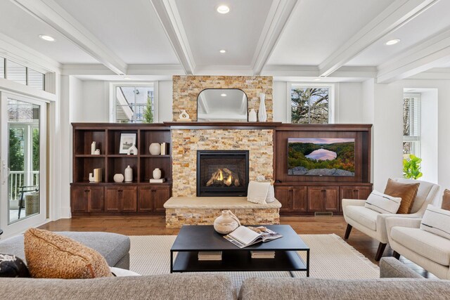 38 Mississippi River Blvd N, Saint Paul, MN 55104 - living room with beamed ceiling, plenty of natural light, wood finished floors, a fireplace, and recessed lighting