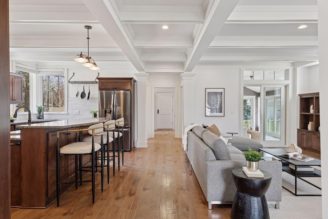 38 Mississippi River Blvd N, Saint Paul, MN 55104 - living room featuring beam ceiling, light wood finished floors, coffered ceiling, recessed lighting, and crown molding
