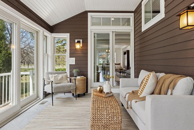 38 Mississippi River Blvd N, Saint Paul, MN 55104 - sunroom / solarium with lofted ceiling, wood walls, and carpet