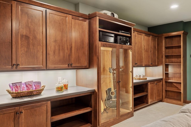 38 Mississippi River Blvd N, Saint Paul, MN 55104 - kitchen featuring open shelves, brown cabinetry, and light countertops
