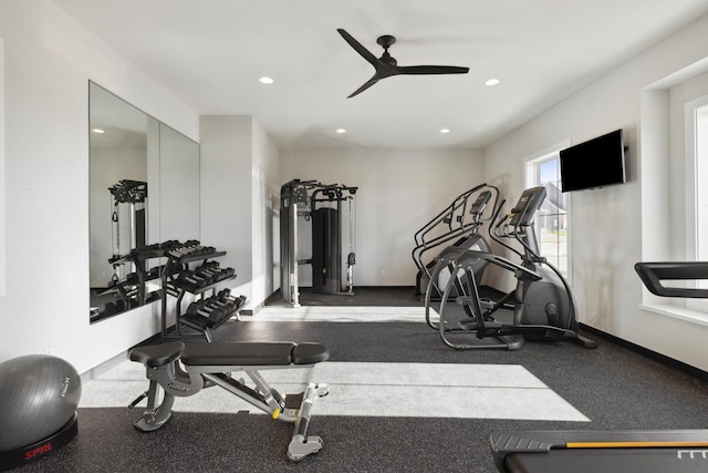 exercise area featuring recessed lighting, a ceiling fan, and baseboards