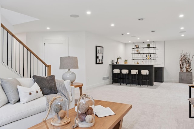 6008 Oaklawn Ave, Edina, MN 55424 - living area with bar area, recessed lighting, light carpet, and stairs