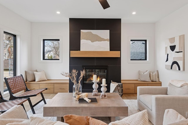 6008 Oaklawn Ave, Edina, MN 55424 - living room featuring wood finished floors, recessed lighting, and a large fireplace