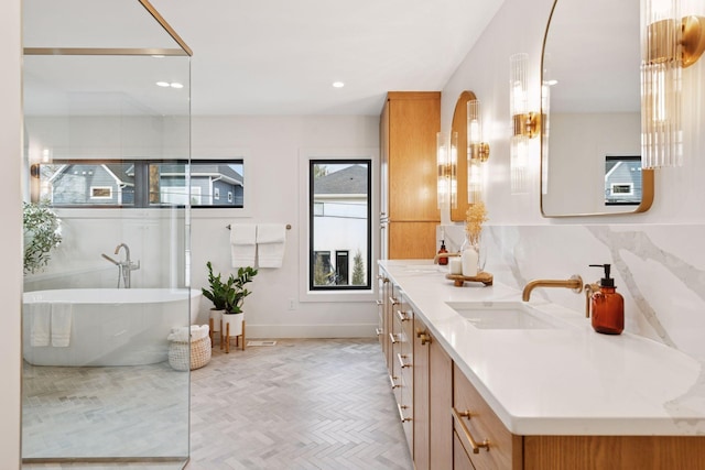 6008 Oaklawn Ave, Edina, MN 55424 - full bath with double vanity, a freestanding tub, and recessed lighting