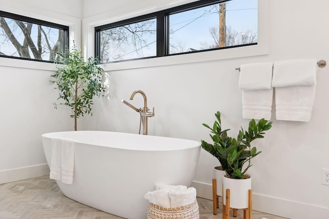 6008 Oaklawn Ave, Edina, MN 55424 - bathroom with a freestanding bath and baseboards