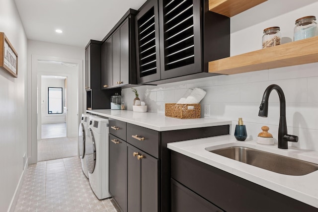 6008 Oaklawn Ave, Edina, MN 55424 - laundry room featuring cabinet space, washer and dryer, light tile patterned floors, and recessed lighting