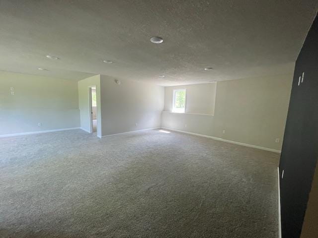 16839 Piper Ln, Brainerd, MN 56401 - carpeted empty room featuring baseboards and a textured ceiling