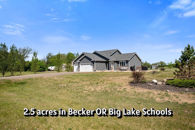 18492 120th St SE, Big Lake, MN 55309 - view of front of property with an attached garage, driveway, and a front yard