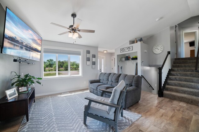 18492 120th St SE, Big Lake, MN 55309 - living room with lofted ceiling, ceiling fan, stairway, and wood finished floors