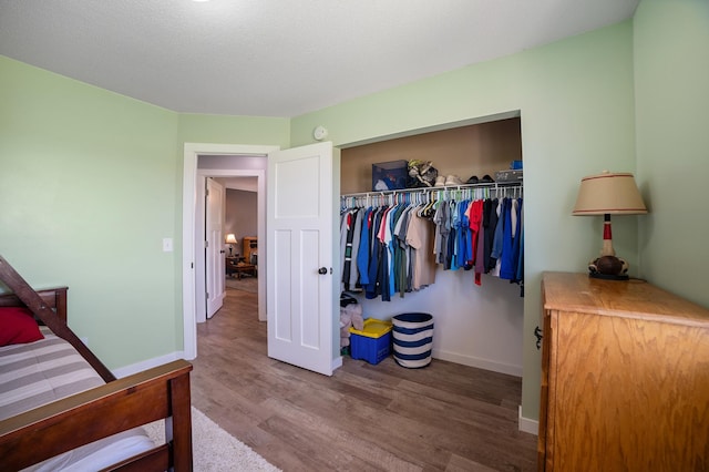 18492 120th St SE, Big Lake, MN 55309 - bedroom with wood finished floors and a closet