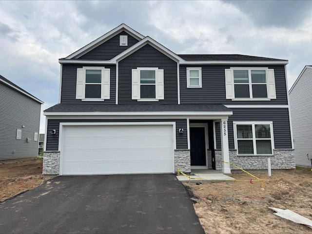 6255 Highland Hills Ln S, Cottage Grove, MN 55016 - craftsman inspired home featuring stone siding, driveway, and a garage