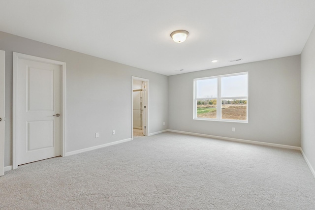 6255 Highland Hills Ln S, Cottage Grove, MN 55016 - unfurnished bedroom featuring baseboards, light colored carpet, and connected bathroom