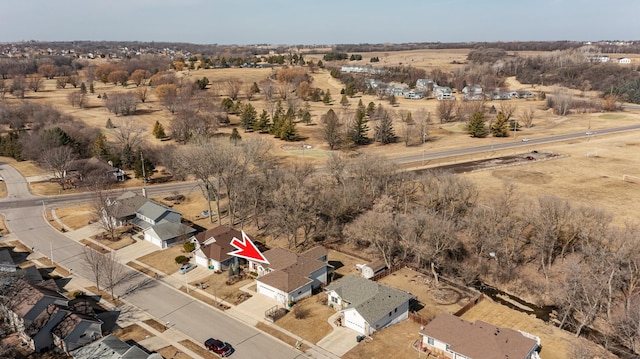 birds eye view of property featuring a residential view and a rural view