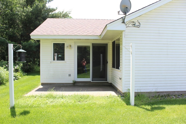 12170 Hillcrest Ct SE, Becker, MN 55308 - rear view of house with a lawn, a patio, and a shingled roof