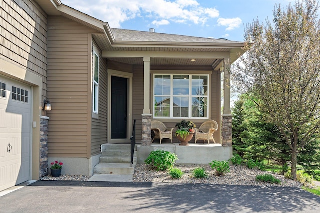 6627 133rd St, Savage, MN 55378 - doorway to property featuring a porch and driveway
