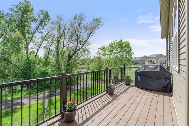 6627 133rd St, Savage, MN 55378 - wooden deck featuring a grill