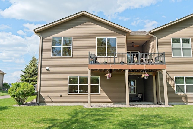 6627 133rd St, Savage, MN 55378 - rear view of property with a lawn, a ceiling fan, a patio, and a deck
