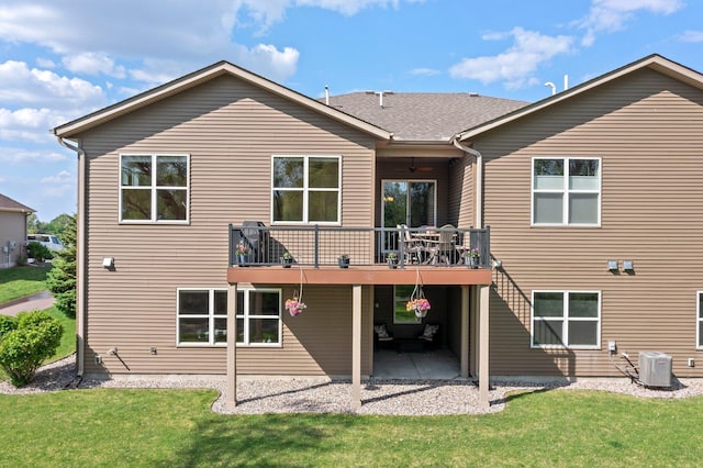 6627 133rd St, Savage, MN 55378 - back of house with a patio, a yard, a deck, and cooling unit