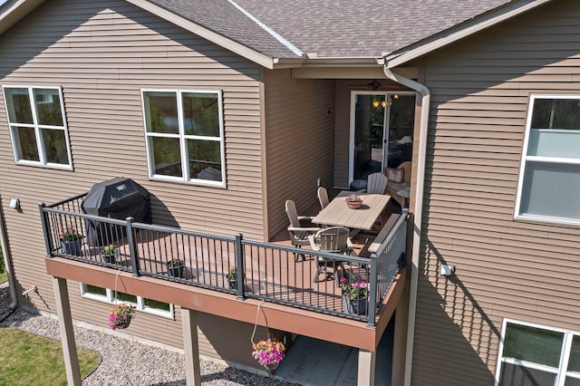 6627 133rd St, Savage, MN 55378 - wooden terrace with area for grilling, ceiling fan, and outdoor dining space