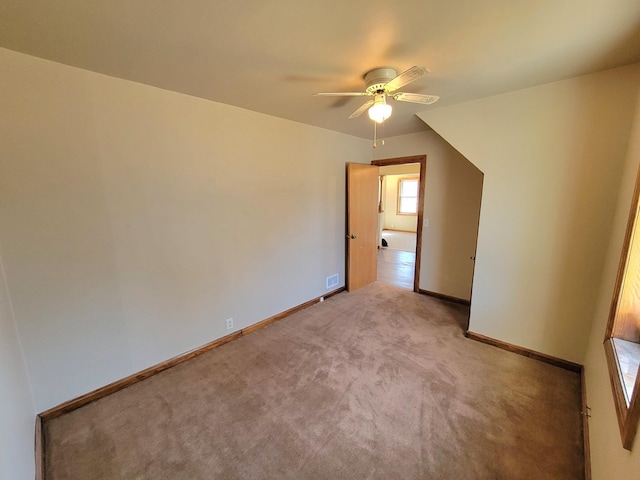 interior space with light colored carpet and baseboards