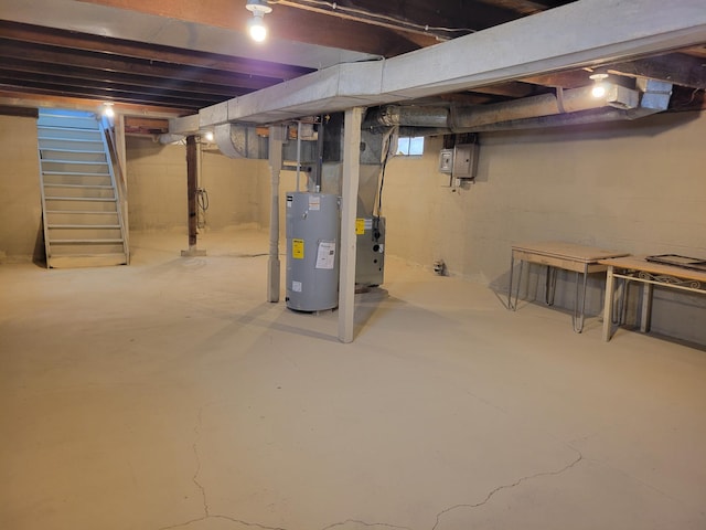 unfinished below grade area with stairs and water heater