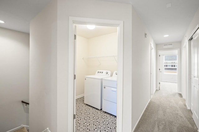 clothes washing area featuring recessed lighting, laundry area, independent washer and dryer, and baseboards