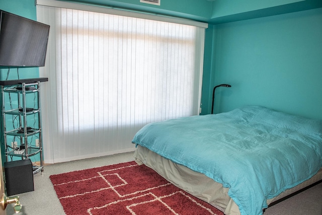 bedroom with visible vents