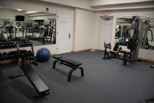 exercise room with baseboards