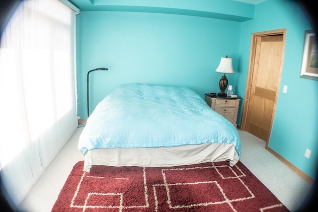bedroom featuring carpet