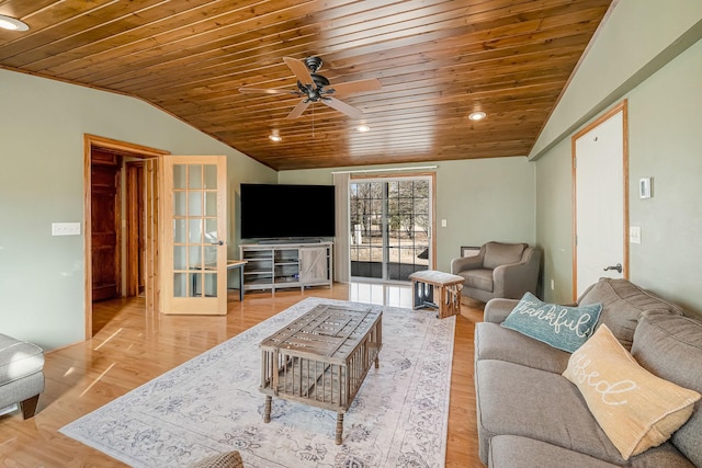 living room with wood finished floors, lofted ceiling, wooden ceiling, and a ceiling fan