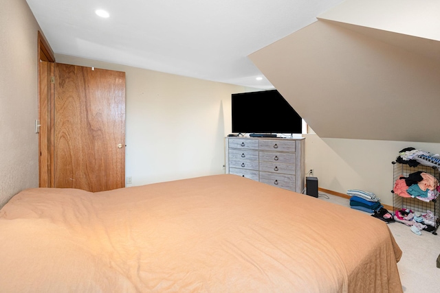 carpeted bedroom with recessed lighting, baseboards, and lofted ceiling