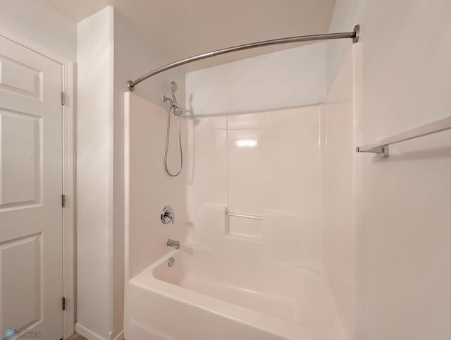 bathroom with shower / bathtub combination