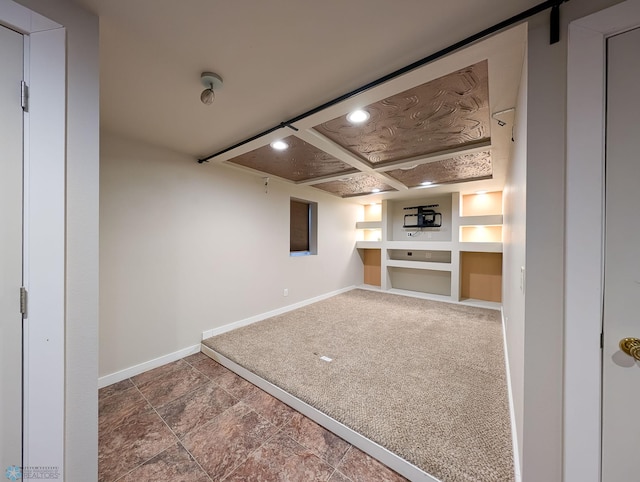 below grade area featuring recessed lighting, baseboards, and carpet flooring