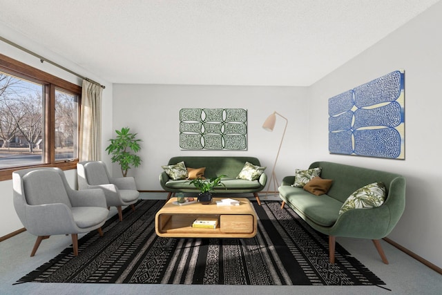 living room featuring baseboards and carpet flooring