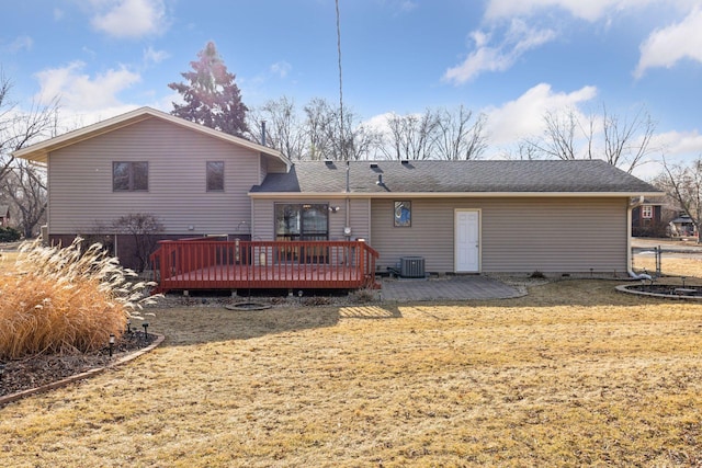 back of property with a yard, central AC unit, a patio, and a deck