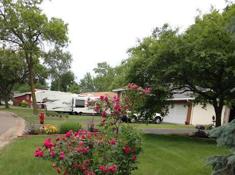 view of home's community with a lawn