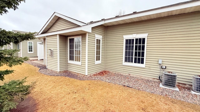 view of property exterior featuring central AC