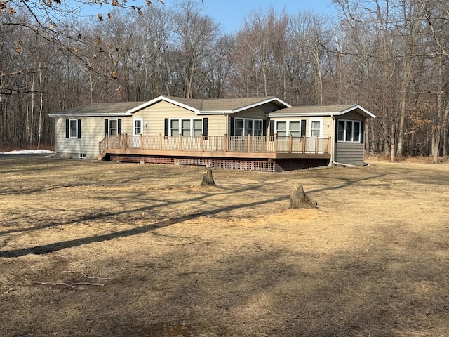 manufactured / mobile home featuring crawl space and a deck