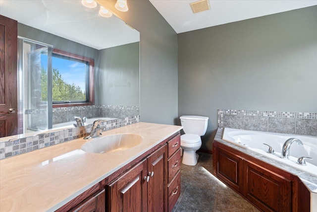 full bath featuring vanity, a bath, visible vents, a stall shower, and toilet