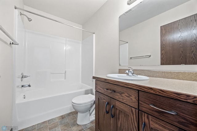 6098 55th Ave S, Fargo, ND 58104 - bathroom with visible vents, vanity, toilet, and shower / bathtub combination