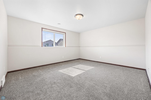 6098 55th Ave S, Fargo, ND 58104 - carpeted empty room with baseboards