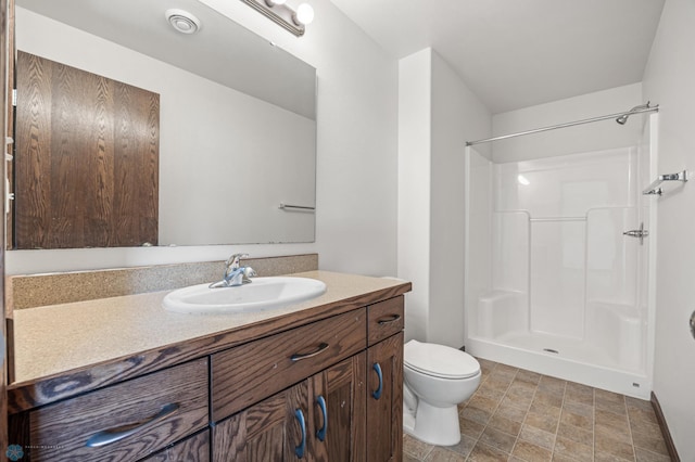 6098 55th Ave S, Fargo, ND 58104 - bathroom with a shower, toilet, and vanity