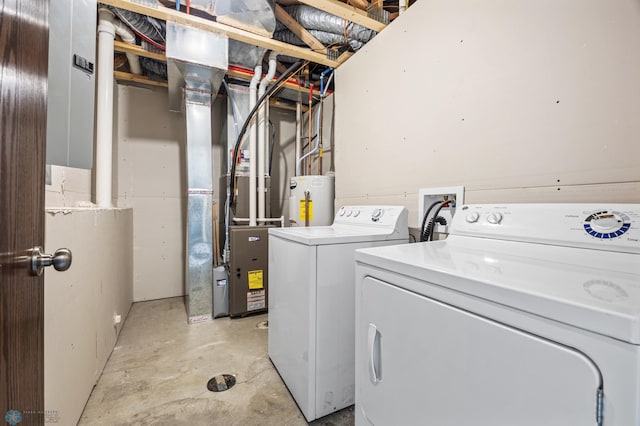 6098 55th Ave S, Fargo, ND 58104 - laundry area featuring washer and clothes dryer, laundry area, and water heater