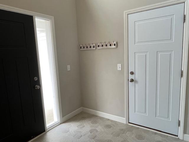 entryway with baseboards