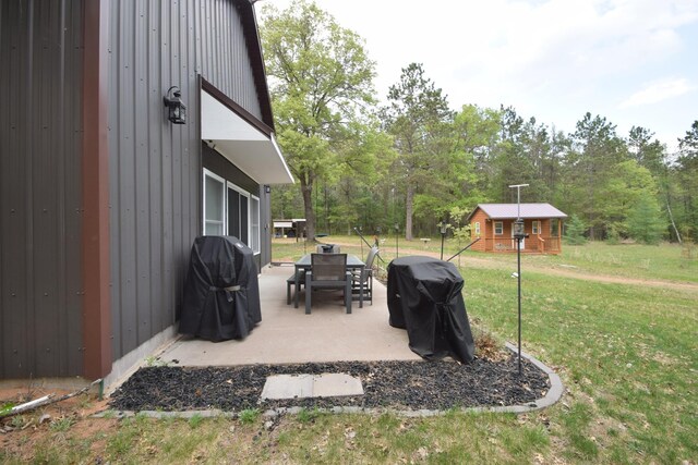 30349 Johnson Creek Trl, Webb Lake, WI 54830 - view of grassy yard with a patio area