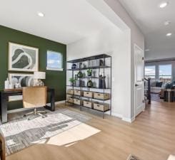 office space featuring recessed lighting, baseboards, and wood finished floors