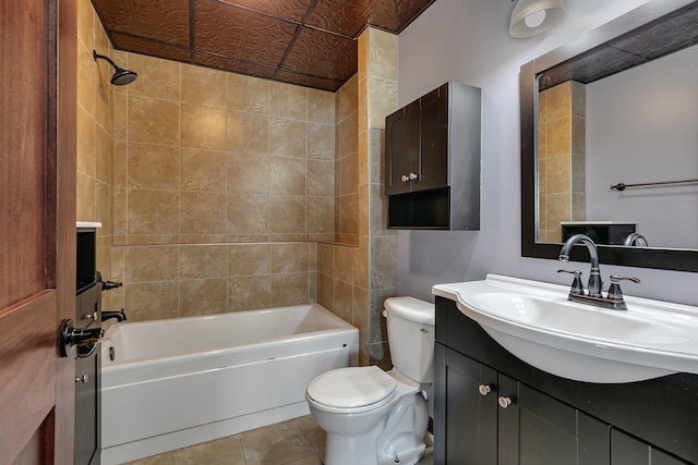 full bath with tile patterned flooring, shower / tub combination, toilet, and vanity