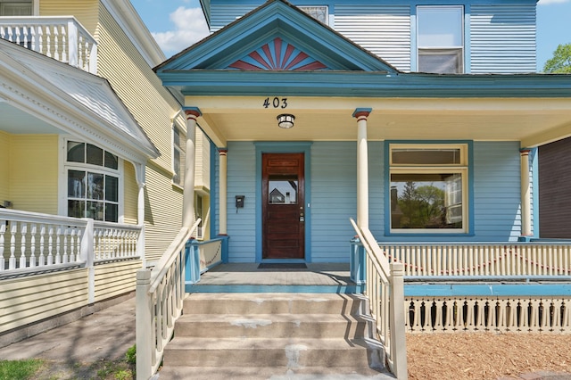 entrance to property with covered porch