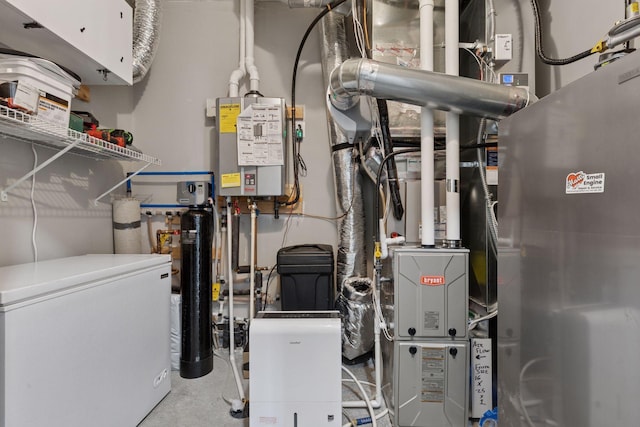 utility room with water heater